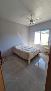 Postel nebo postele na pokoji v ubytování Quinta Las Margaritas + 3 fotografie