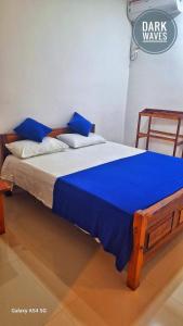 Letto o letti in una camera di Dark waves villa