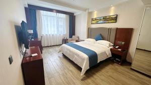 Voodi või voodid majutusasutuse Bestway Hotel Xi'an toas