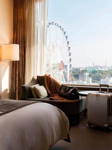 Postel nebo postele na pokoji v ubytování Lotte Hotel Ulsan