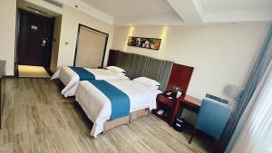 Voodi või voodid majutusasutuse Bestway Hotel Xi'an toas