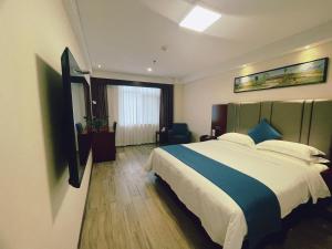 Voodi või voodid majutusasutuse Bestway Hotel Xi'an toas