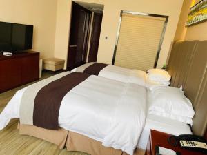 Voodi või voodid majutusasutuse Bestway Hotel Xi'an toas