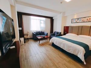Televiisor ja/või meelelahutuskeskus majutusasutuses Bestway Hotel Xi'an