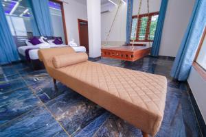 Postel nebo postele na pokoji v ubytování Skylar Seaview Beach Resort & Ayurveda Varkala