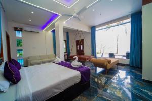Postel nebo postele na pokoji v ubytování Skylar Seaview Beach Resort & Ayurveda Varkala