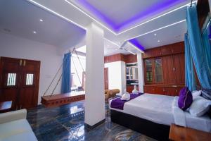 Postel nebo postele na pokoji v ubytování Skylar Seaview Beach Resort & Ayurveda Varkala
