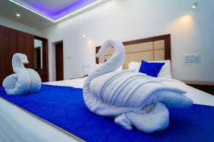 Postel nebo postele na pokoji v ubytování Skylar Seaview Beach Resort & Ayurveda Varkala