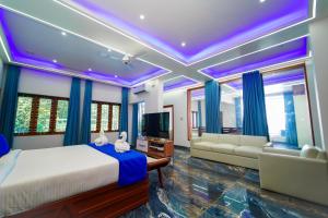 Postel nebo postele na pokoji v ubytování Skylar Seaview Beach Resort & Ayurveda Varkala