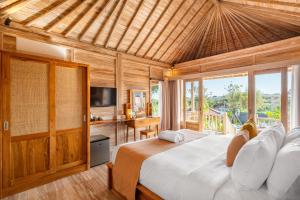 TV a/nebo společenská místnost v ubytování Cove D Ancak Villa and Bungalow