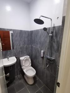 Koupelna v ubytování Jkenter Suites