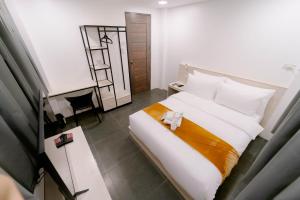 Postel nebo postele na pokoji v ubytování A Traveller's Inn