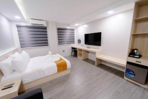 TV a/nebo společenská místnost v ubytování A Traveller's Inn