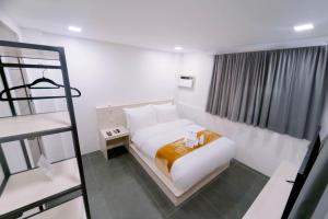 Postel nebo postele na pokoji v ubytování A Traveller's Inn