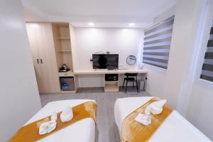 Postel nebo postele na pokoji v ubytování A Traveller's Inn