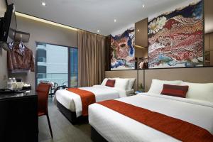 Кровать или кровати в номере Hotel Boss - SG Clean
