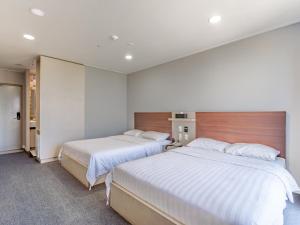 Cordelia Hotel客房内的一张或多张床位