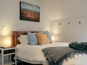 Ένα ή περισσότερα κρεβάτια σε δωμάτιο στο A Perfect Stay -Bartlett By The Park