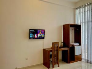 TV a/nebo společenská místnost v ubytování Easy Stay