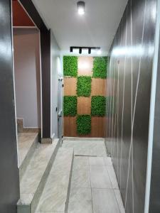 Imagine din galeria proprietății Family Suite - 2CH dont 1 en option ou payante ET1D în Douala +2 fotografii