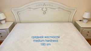 Voodi või voodid majutusasutuse ЦентрКомфорт 2х.комн.квартира toas