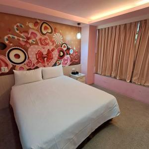 Ένα ή περισσότερα κρεβάτια σε δωμάτιο στο Morwing Hotel Fuzhong