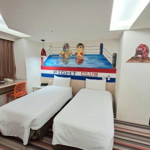 Ένα ή περισσότερα κρεβάτια σε δωμάτιο στο Morwing Hotel Fuzhong