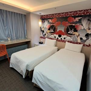 Ένα ή περισσότερα κρεβάτια σε δωμάτιο στο Morwing Hotel Fuzhong