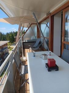 Balkón nebo terasa v ubytování Les Villages du Bachat à Chamrousse 1700 -Silènes A32 - Classé 3 étoiles