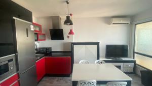 Kuchyň nebo kuchyňský kout v ubytování Apartamento Benalmadena playa