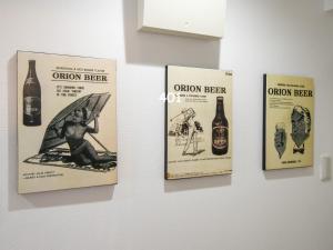 a group of signs on a wall at Matsufuji 4F 401 or 402 in Naha