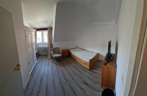 Postel nebo postele na pokoji v ubytování Hotel Platzhirsch