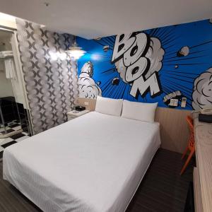 Ένα ή περισσότερα κρεβάτια σε δωμάτιο στο Morwing Hotel Fuzhong