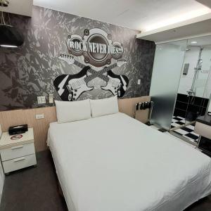Ένα ή περισσότερα κρεβάτια σε δωμάτιο στο Morwing Hotel Fuzhong
