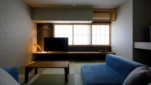 TV o dispositivi per l'intrattenimento presso 越中井波町屋旅館古香里庵