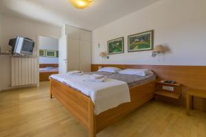 Postel nebo postele na pokoji v ubytování HAUS KATARINA