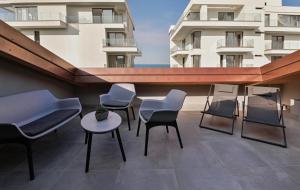 En balkon eller terrasse på LE MARIN contemporary apartments