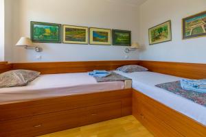 Postel nebo postele na pokoji v ubytování HAUS KATARINA