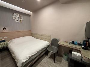 晶晶輕旅民宿瑞芳車站客房内的一张或多张床位