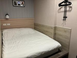 晶晶輕旅民宿瑞芳車站客房内的一张或多张床位