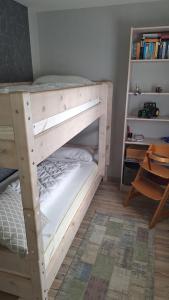 Ένα ή περισσότερα κρεβάτια σε δωμάτιο στο Am Ringwall 76