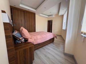 Postel nebo postele na pokoji v ubytování Goit Bhawan