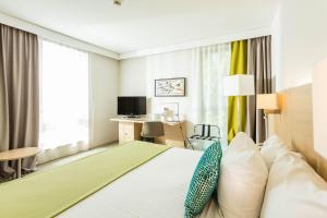 Postel nebo postele na pokoji v ubytování Courtyard by Marriott Montpellier