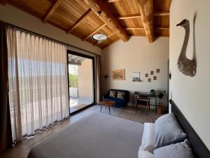 Postel nebo postele na pokoji v ubytování Podere l'Alfina B&B - Bio Agriturismo + 37 fotografií
