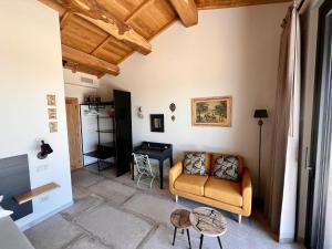 Posezení v ubytování Podere l'Alfina B&B - Bio Agriturismo