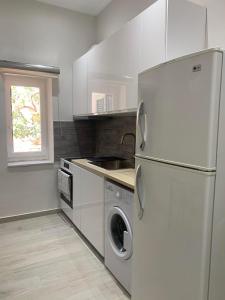Köök või kööginurk majutusasutuses Aeacus Serenity Apartment