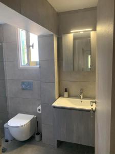 Koupelna v ubytování Aeacus Serenity Apartment