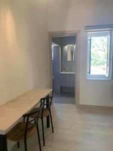 Kuchyň nebo kuchyňský kout v ubytování Aeacus Serenity Apartment