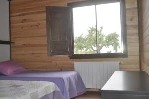 Postel nebo postele na pokoji v ubytování Casa Rural Mentesana + 25 fotografií