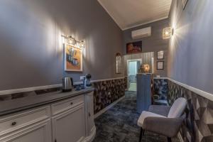 Un lugar para sentarse en Bello Urban Boutique - Golden Keys Collection